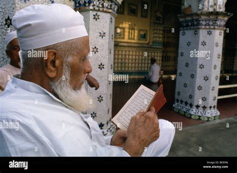 Bangladesh South Asia Dhaka Muslim Man Reading The Koran Outside Chand