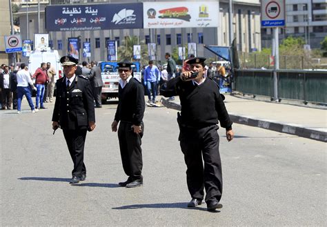 2 Egyptian Police Officers Killed By Unidentified Gunmen In Cairo