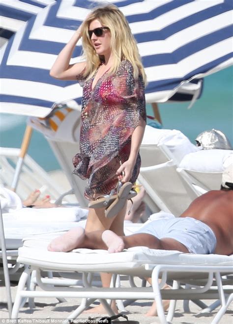 Ellie Goulding In Hot Pink Bikini While Enjoying A Beach Day With Male Companion Daily Mail Online
