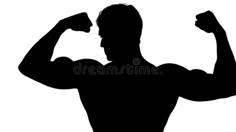 Muscular Silhouette Of Man Flexing Muscles Stock Footage Video Of