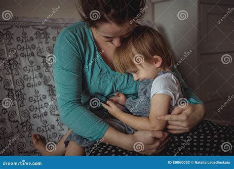 Pregnant Mom And Son Toddler Playing With Phone Lifestyle Rea Stock