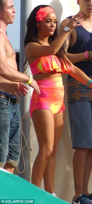 chelsee healy suffers style mishap in neon bikini with huge bottoms as she parties in ibiza