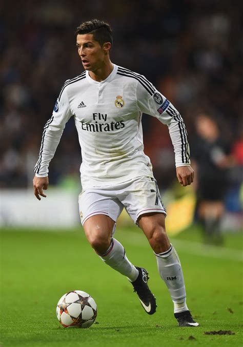 Cristiano Ronaldo Of Real Madrid Runs With The Ball During The Uefa
