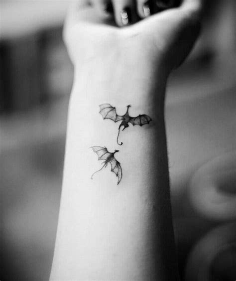 Two Dragons Flying Small Wrist Tattoo Dragon Tattoo Design Black White