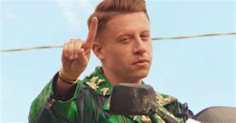 But those that triumph, embrace the fight 'cause. Your GIF Guide to Macklemore's Bonkers, Broadway-Inspired 'Downtown' Video