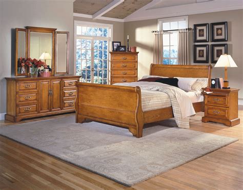 This set comes with a beautiful spacious dresser along with 2 single drawer nightstands that allow convenience and storage on either side of the wood and upholstered platform bed. Honey Creek Caramel Sleigh Bedroom SetMedia Title | Oak ...