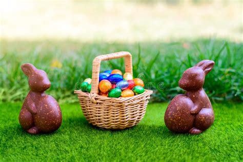 Chocolate Easter Bunny With Basket Full Of Eggs Stock Photo Image Of