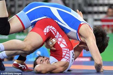 piledrivers and headlocks galore as women go toe to toe for wrestling gold daily mail online