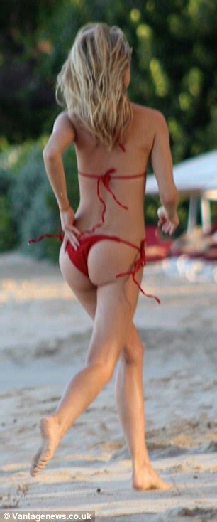 Kimberley Garner Does Her Best Baywatch Impression In Red Bikini In The Caribbean Daily Mail