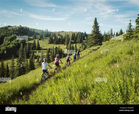 Parents With Children 10 1112 13 14 15 During Bike Trip Stock Photo