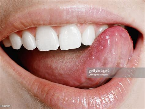 Young Woman Licking Lips Closeup Of Mouth Photo Getty Images