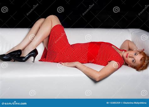 The Beautiful Woman Lying On A Sofa Stock Image Image Of Fashion