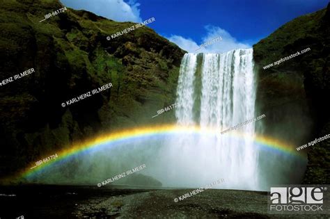 Rainbow Over Skogafoss Waterfall Iceland Atlantic Ocean Stock Photo