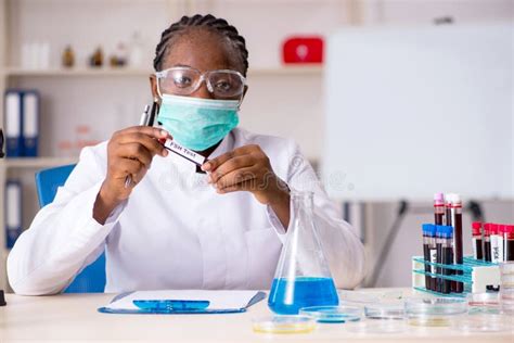 The Young Black Chemist Working In The Lab Stock Image Image Of Glass