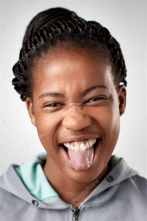 Black Girl Making Funny Face — Stock Photo © Daxiaoproductions 129336698