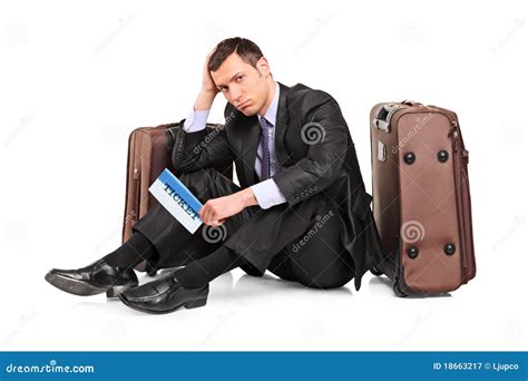 Sad Business Traveler Seated Next To A Suitcase Stock Image Image