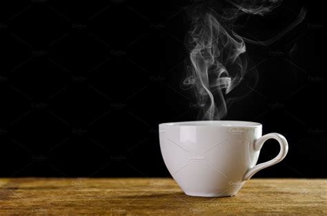 White Coffee Cup With Smoke Containing Aroma Background And Beans
