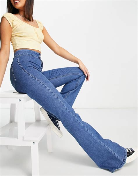 Topshop Joni Flare Recycled Cotton Blend Jean In Mid Blue Blues