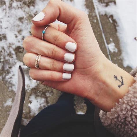 Tattoos for hands and wrists for girls. 31 Small Hand Tattoos That Will Make You Want One ...
