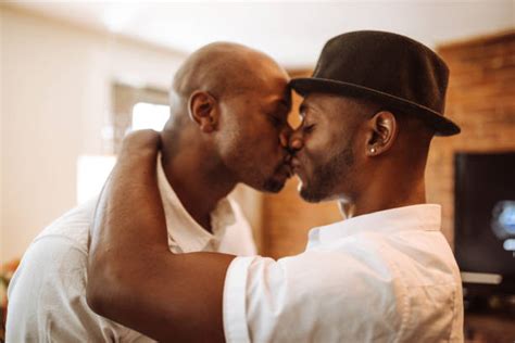 black gay men kissing stock  pictures royalty  images istock