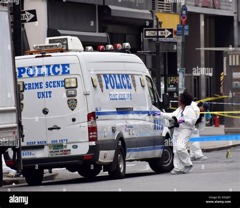 New York May 13 Nypd Crime Scene Investigators Probe The Scene Of A