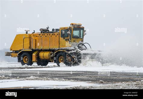 A 436th Civil Engineer Squadron Runway Sweeper Clears Snow From The