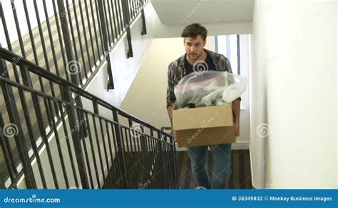 Man Moving Into New Home Carrying Box Upstairs Stock Video Video Of