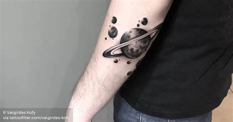 Saturn Tattoo On The Left Forearm