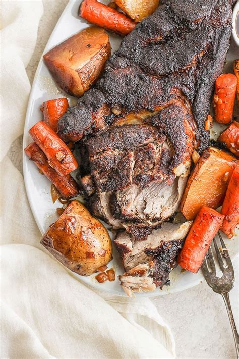 Preheat oven to 250 and rub salt and spices over the entire pork shoulder. This slow cooker pork roast is fall off the bone delicious and all you have to do… | Slow cooker ...