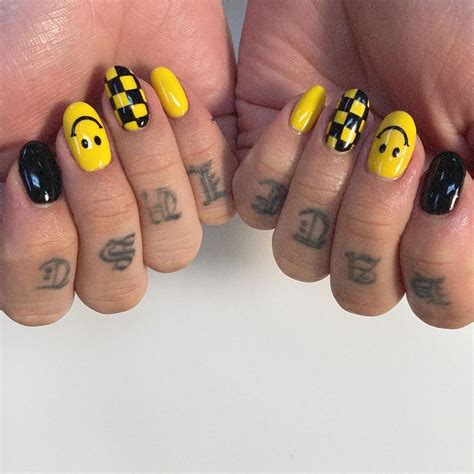 All Black Smiley Face Nails