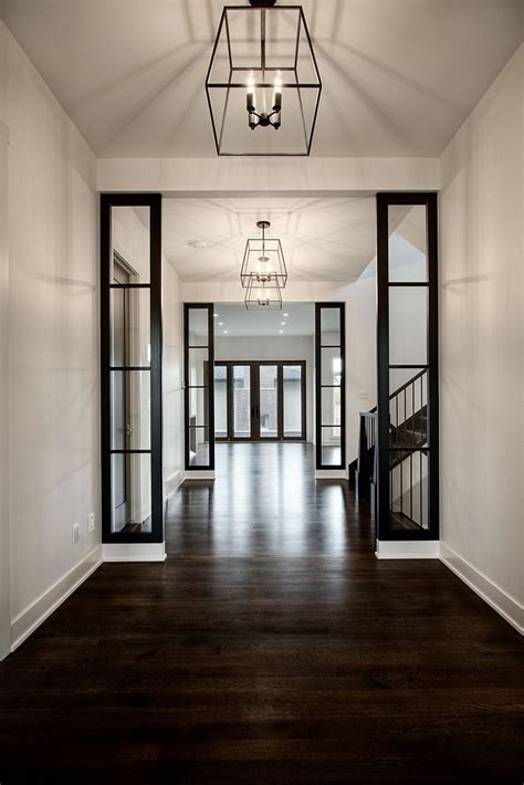 Cover the space with a large natural fiber rug. Semi-gloss dark hardwood flooring Classic Semi-gloss dark ...