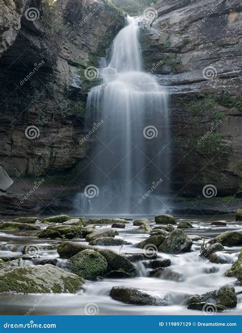 Enchanting Waterfall La Foradada The Holed One Stock Image Image Of