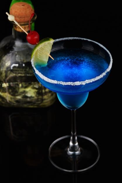 Free Photo Exotic Cocktail With Lime And Cherry