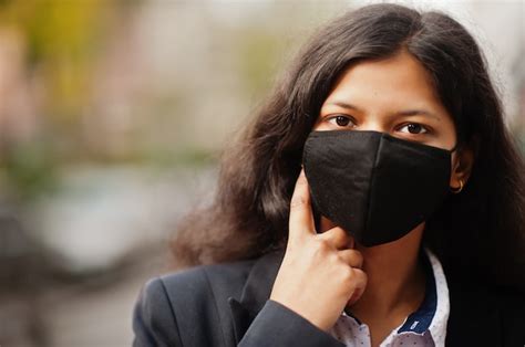 Premium Photo Gorgeous Indian Woman Wear Formal And Black Face Mask Posing At Street During