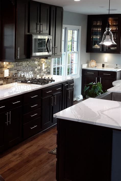 Quartz countertops come with a variety of advantages. Dark Kitchen Cabinets With Light Countertops | Home Designs
