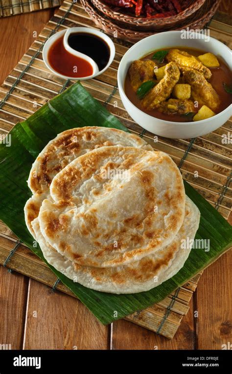 Roti Canai And Straits Chicken Curry Malaysia Food Stock Photo Alamy