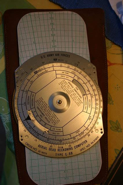 A circular slide rule side for making quick calculations note the outside air temperature and convert it to celsius using the conversion scale at the bottom of the flight computer. Flight Computers - a gallery on Flickr