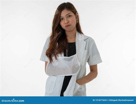 The Female Doctor Shows A Bored Expression In Her Broken Arm Stock