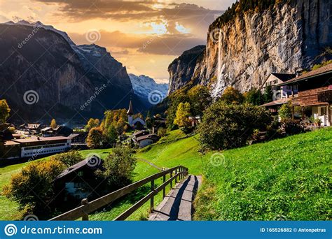 Famous Lauterbrunnen Valley With Gorgeous Waterfall And Swiss Alps