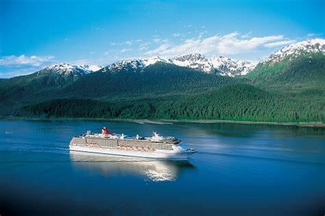 Carnival Spirit Sailing Past Snowcapped Mountains In Alaska