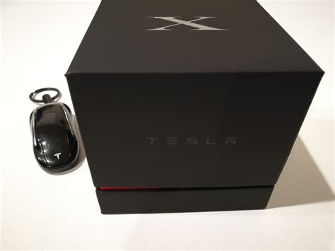 How To Set Up And Change Batteries On The Tesla Model X Key Fob Gtrusted