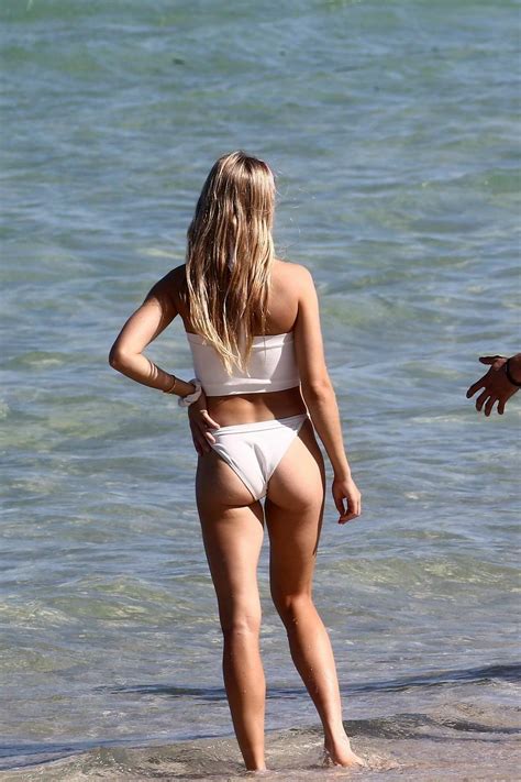 Eugenie Bouchard Heats Up The Beach In A White Bikini In Miami Florida