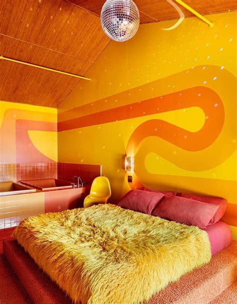 this new retro themed nashville hotel is giving us some serious 70 s vibes retro bedrooms