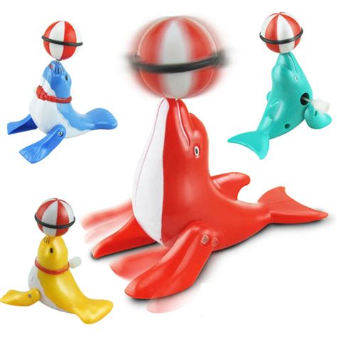 1pcs Kids Wind Up Clockwork Toy Cartoon Dolphins Ball Educational Toys