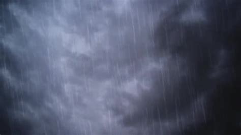 Heavy Rain Falling From Dramatic Sky With Dark Stormy