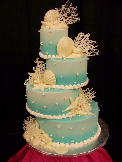 Beach cake...kind of like the staggered layers Beach Theme Wedding