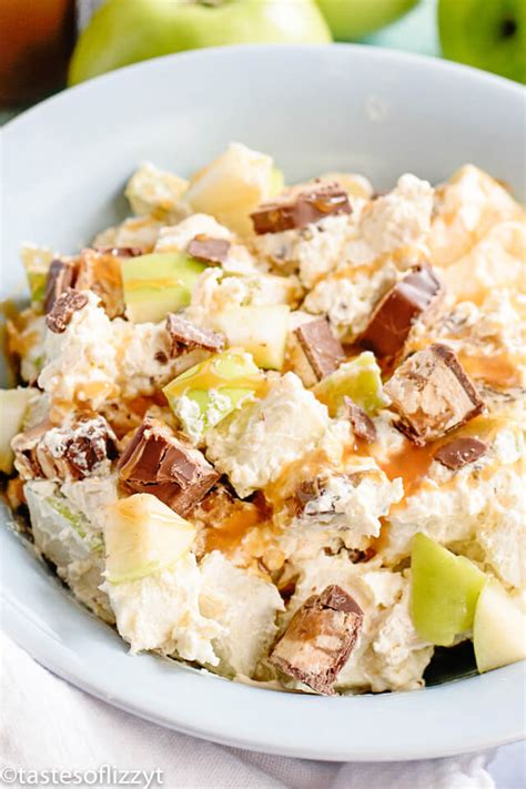 In a medium serving bowl, dump chopped apples & candy bar pieces. Snickers Apple Salad Recipe {Easy Fruit Dessert or Side Dish Recipe with Caramel}