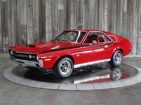 290 v8 with a four barrel, automatic transimmion with power up for sale is a 1970 amc rebel sst. 1970 AMC AMX 4SPD AC RESTORED
