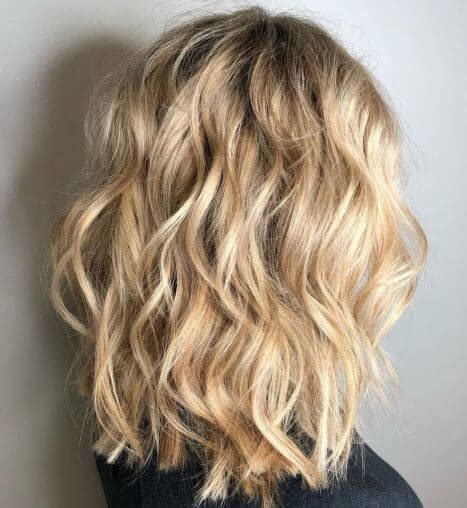 Looking for cute and easy to style shoulder length hair ideas? 30 Best Curly Hairstyles for Medium Hair - BelleTag