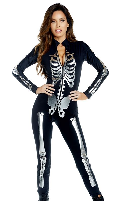 A Woman In Skeleton Costume Posing For The Camera With Her Hands On Her Hips And Arms Behind Her
